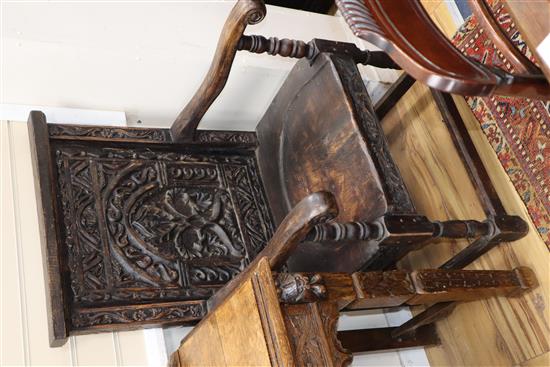 A pair of carved oak Wainscot chairs, W.60cm, D.60cm, H.110cm